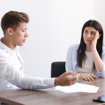 SMSF trustees discussing a related party transaction compliance issue