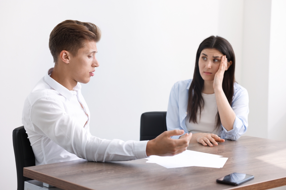 SMSF trustees discussing a related party transaction compliance issue
